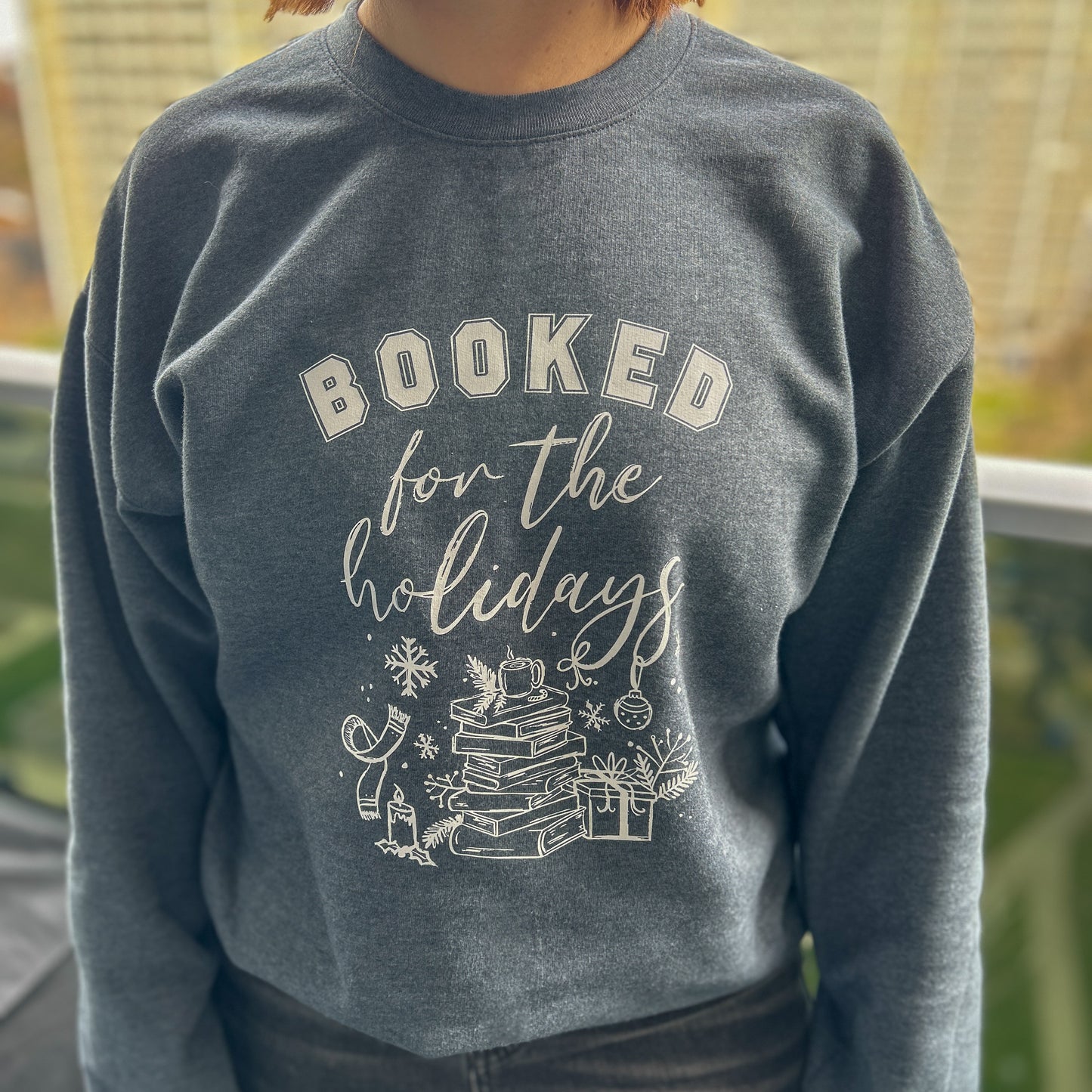 The Booked for the Holidays Crew Sweatshirt