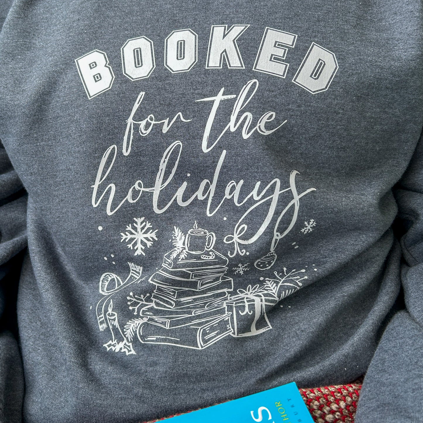 The Booked for the Holidays Crew Sweatshirt