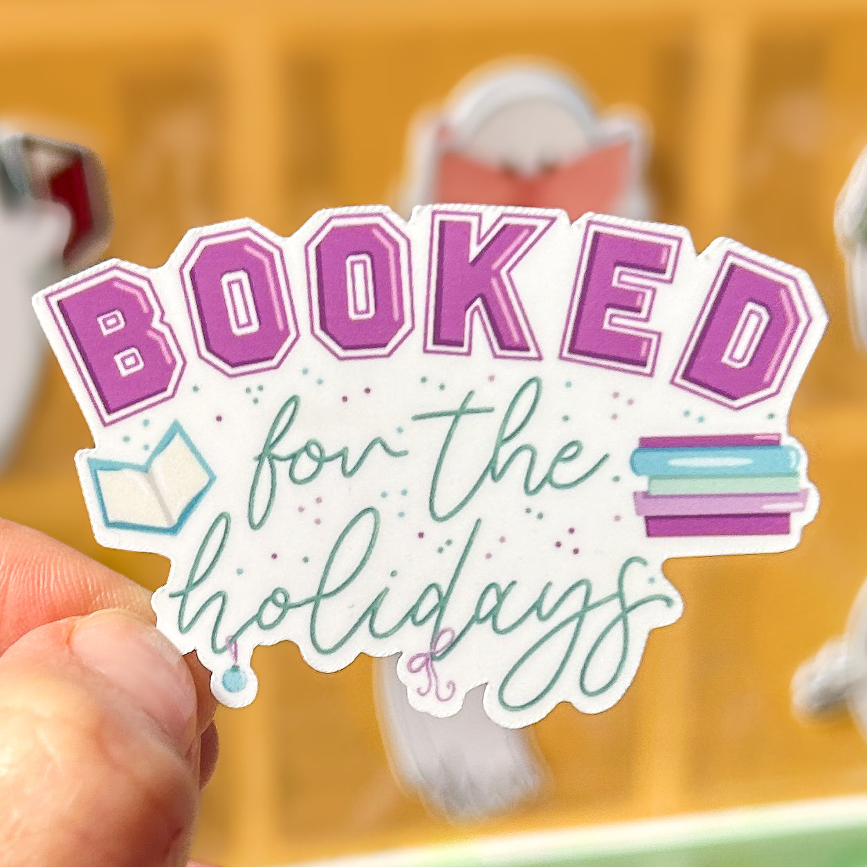 The Booked for the Holidays Sticker